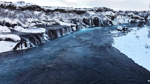 Waterfall in Iceland Snowy Mountain with Cold River in Winter Magical Winter Time Location of Snow