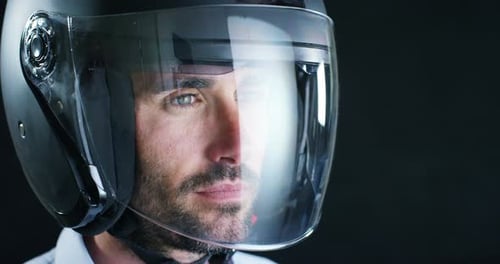 Close Up of Man in Black Helmet