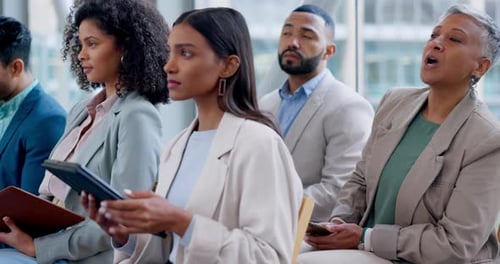 Diverse Group Attends Corporate Seminar in Modern City