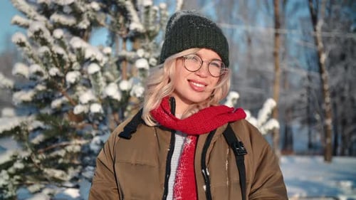 Portrait Smiling Winter Woman Posing at Snowy Sunny Forest with Spruce Fir Tree Natural Day Light