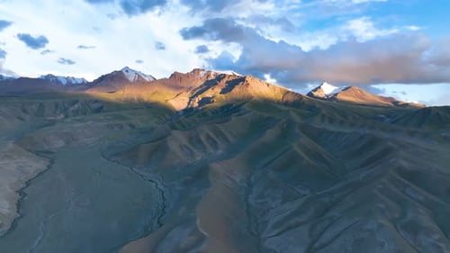 Snow Capped Mountains Aerial View at Sunrise