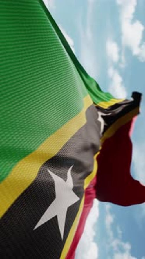 Vertical Flag of Saint Kitts and Nevis Waving in the Wind
