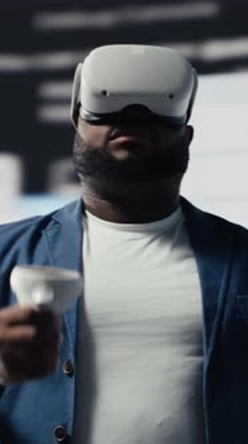 Vertical Video African American Software Developer Uses Virtual Reality Headset for Coding