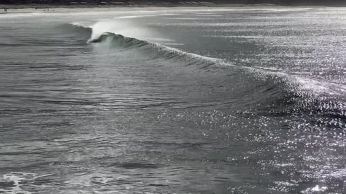 Waves rolling into the beach