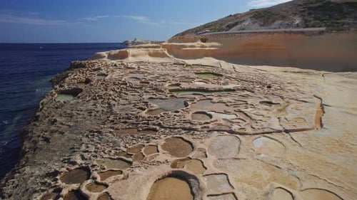 Low Wide Dolly of Salt Pans on Gozo Island, Malta