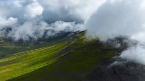 Clouds Above Mountain Tops Paradise Heaven Mountain Range with High Peaks Flying Through the Clouds
