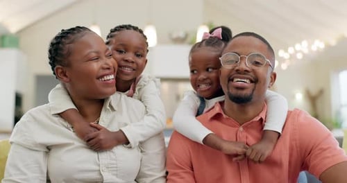 Loving Family Smiling Together at Home