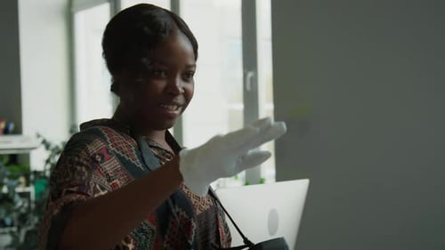 Professional Female Photographer Using Camera in Studio