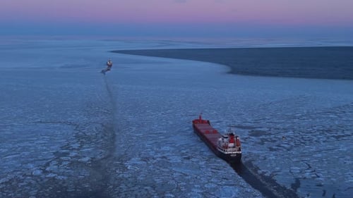 Ship Traversing Frozen Waters Deliberately Cargo Vessel Moves Through Icy Passage Intentionally