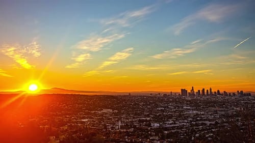 Time-lapse of sunrise behind the Los Angeles skyline from the westside of downtown