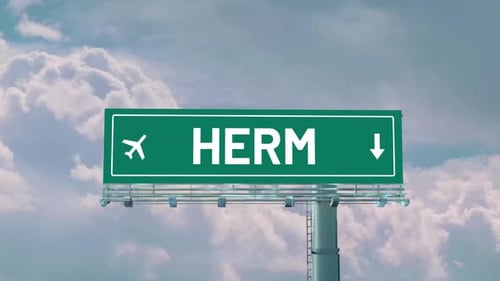 Panneau routier d'arrivée d'un avion à Herm