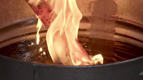 Intense Fire Flames Erupting from Container