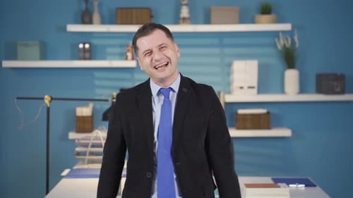 Businessman dancing with happiness. Happy businessman. Dancing businessman.