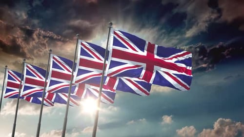Realistic Waving United Kingdom Flags Against Dramatic Sky