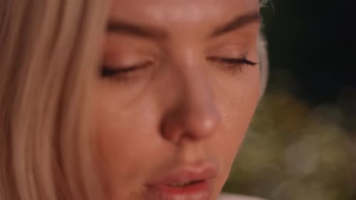 A Contemplative Moment An Intimate Close Up of a Woman Deep in Thought and Reflection