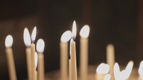 Candles shining and oscillating in Church