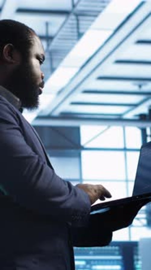 Vertical Video Technician in Data Center Running System Diagnostic Tests