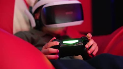 Child Playing Video Games with VR Headset