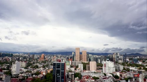 hyperlapse shot at a very cloudy day in mexico city at midday