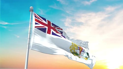 Flag of British Antarctic Territory Waving Against a Sunset Sky