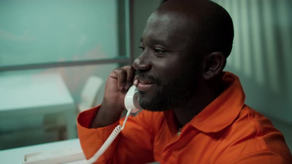 Positive Inmate Talking on Phone with Family in Prison, People Stock ...