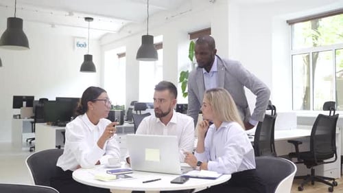 Multiethnic Business People During Meeting in Modern Office