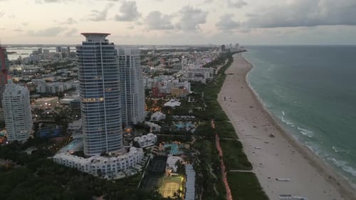 Aerial Drone Fly Above Miami South Beach, Sea Coast Resorts and Dayline Skyline, United States of Am