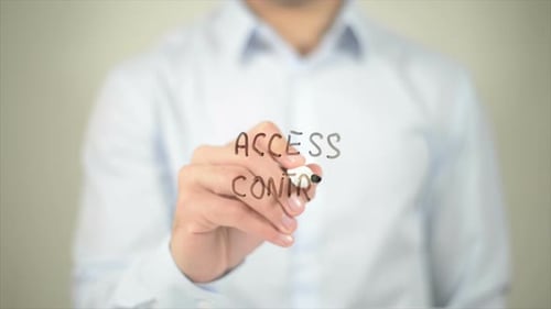 Access Control Man Writing on Transparent Screen