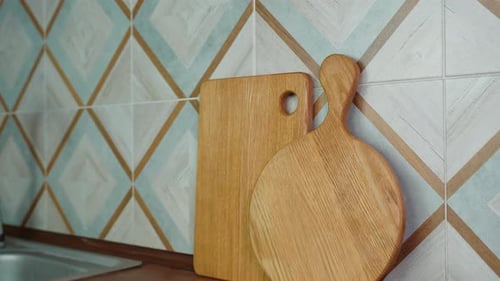 Two Wooden Handmade Craft Cutting Boards on Kitchen
