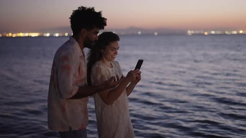 Comentarios de pareja sobre el smartphone en la Albufera