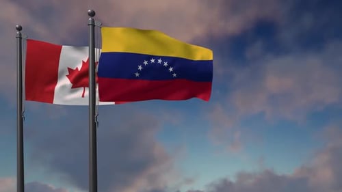 Waving Flags of Canada and Venezuela Against a Cloudy Sky