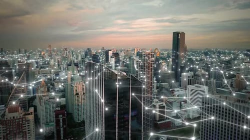 Aerial skyline at sunset modern smart digital city with animation of computer data web connection