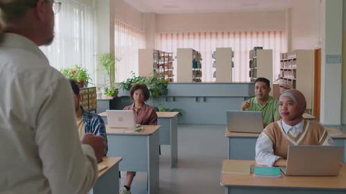 Students Using Laptops in a Classroom