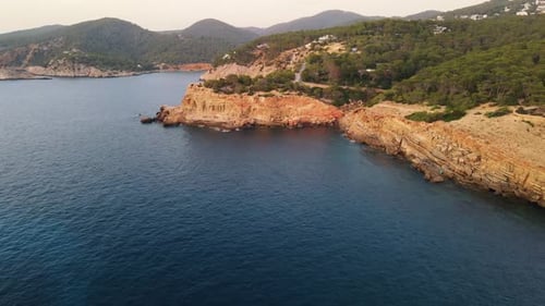 Punta Galera Rocky Coastline In Ibiza. Aerial Dolly Forward