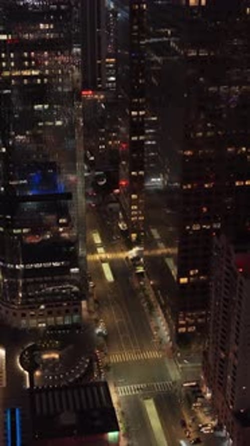 Los Angeles Downtown at Night with Skyscrapers and Street Traffic Urban Architecture and Illuminated