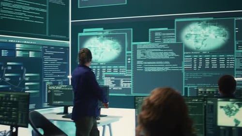 Adults Working on Computer Code and Global Maps