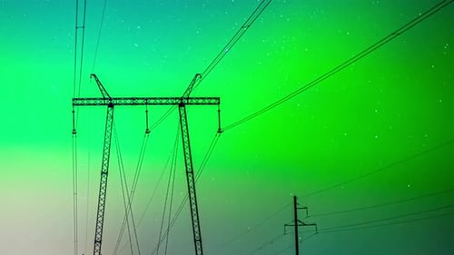 Beautiful northern lights starry sky time lapse over power transmission poles