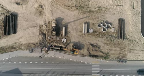 Aerial View of Construction Site with Heavy Equipment