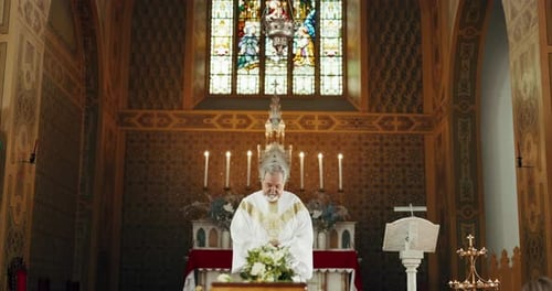 Funeral, church and priest with prayer by coffin for memorial service, sermon