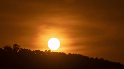 Golden Sunrise Time Lapse Behind Mountains