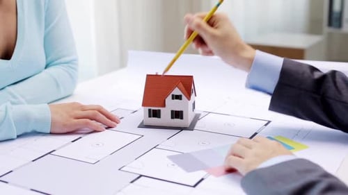 Architecture, Building, Construction, Real Estate And People Concept - Woman And Male Architect D...