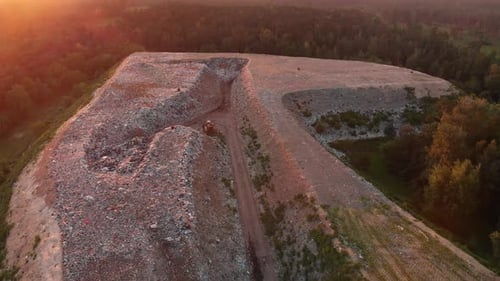 Aerial wide shot Around city landfill site or large trash dump
