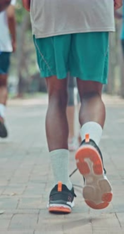 Running, marathon and health with people in city for sports, challenge and workout