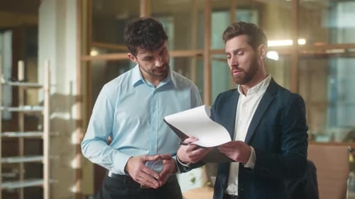 Caucasian Men Entrepreneurs Adults Coworkers Business Partners Indoors Discuss Office Deal