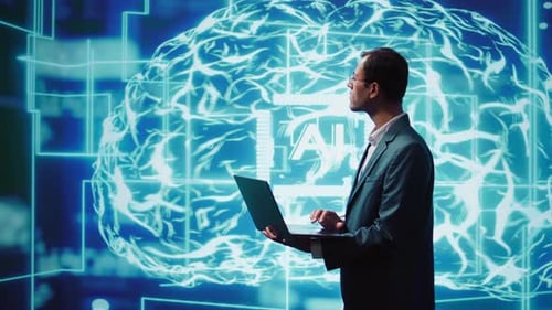 Informatiker nutzt Laptop zur Implementierung künstlicher Intelligenz