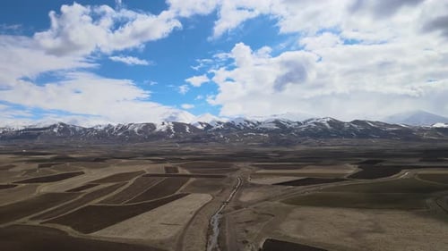 Majestic Mountains Overlook Rural Farmlands