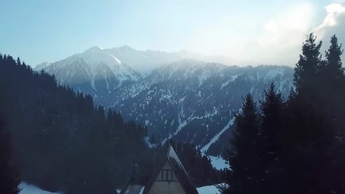 Aerial view of chalet cottages in mountain resort