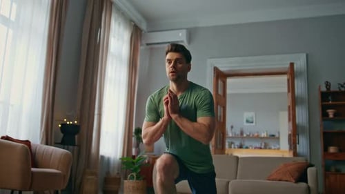 Man Exercising with Lunges in Living Room