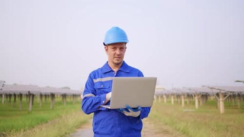 Portrait of engineer work to maintenance of photovoltaic panel system.