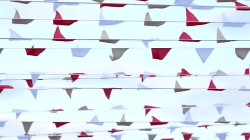 Red White Pennant Banners Fluttering in the Wind